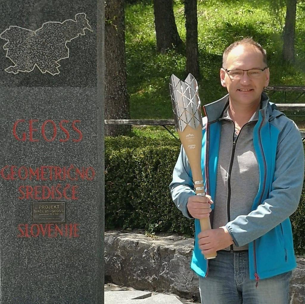 Boris Doblekar s slovensko olimpijsko baklo na Geossu